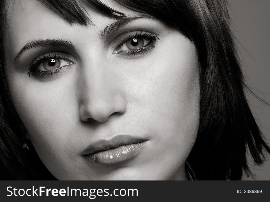 Close-up portrait of fresh and natural beautiful girl with professional make-up in black and white. Close-up portrait of fresh and natural beautiful girl with professional make-up in black and white
