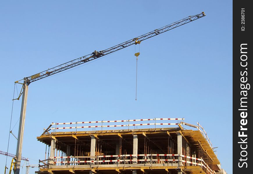 Crane on a construction site. Crane on a construction site