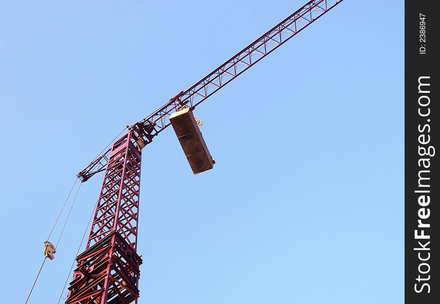 Crane on a construction site. Crane on a construction site