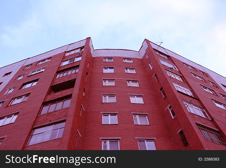 View of red brick block of flats typical for Russian cities. View of red brick block of flats typical for Russian cities