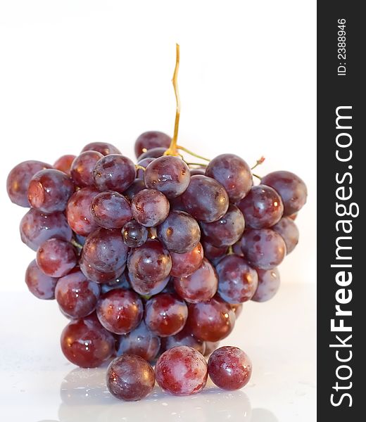 Bunch of grapes on glass table