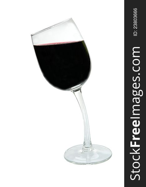 Alcoholism and drunk driving concept: isolated glass of red wine at leaning stem. Alcoholism and drunk driving concept: isolated glass of red wine at leaning stem