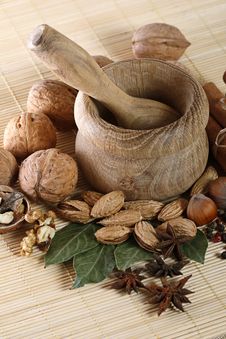 Wooden Mortar And Pestle With Spices And Nuts Stock Photo Wooden Mortar And Pestle With Spices And Nuts Stock Photo
