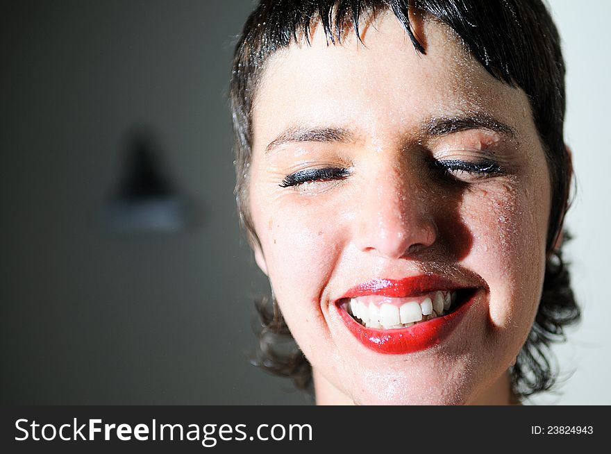 Face Of Beautiful Girl With Water On The Skin
