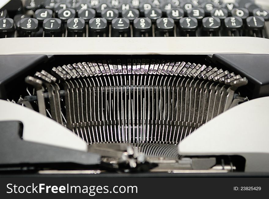 Close up of the letters on an old typewriter.