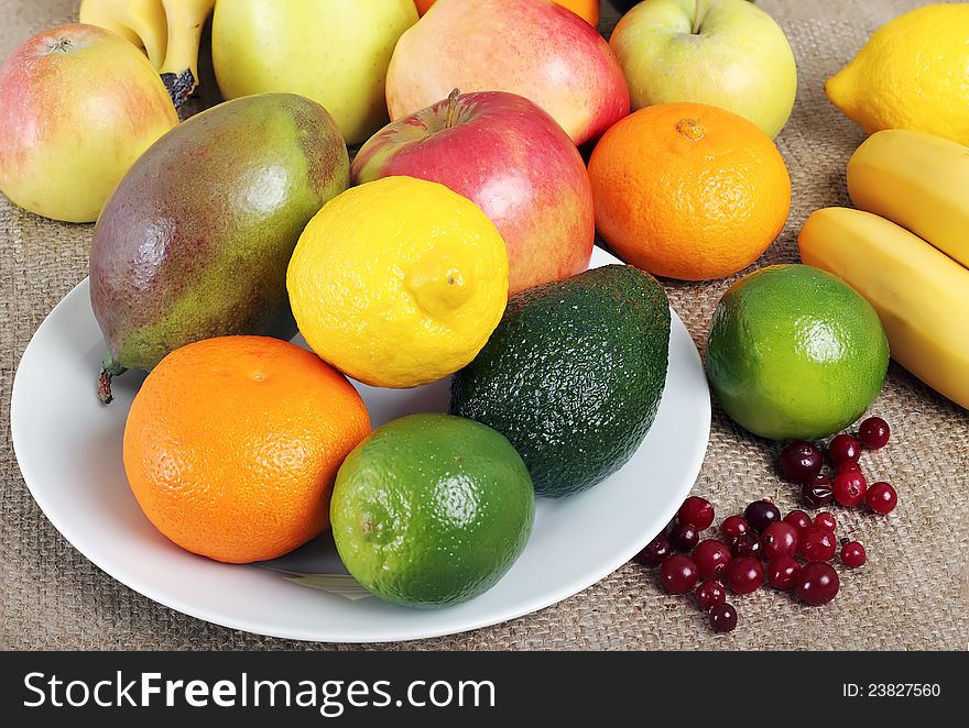 Still-life with autumn and exotic fruit. Still-life with autumn and exotic fruit