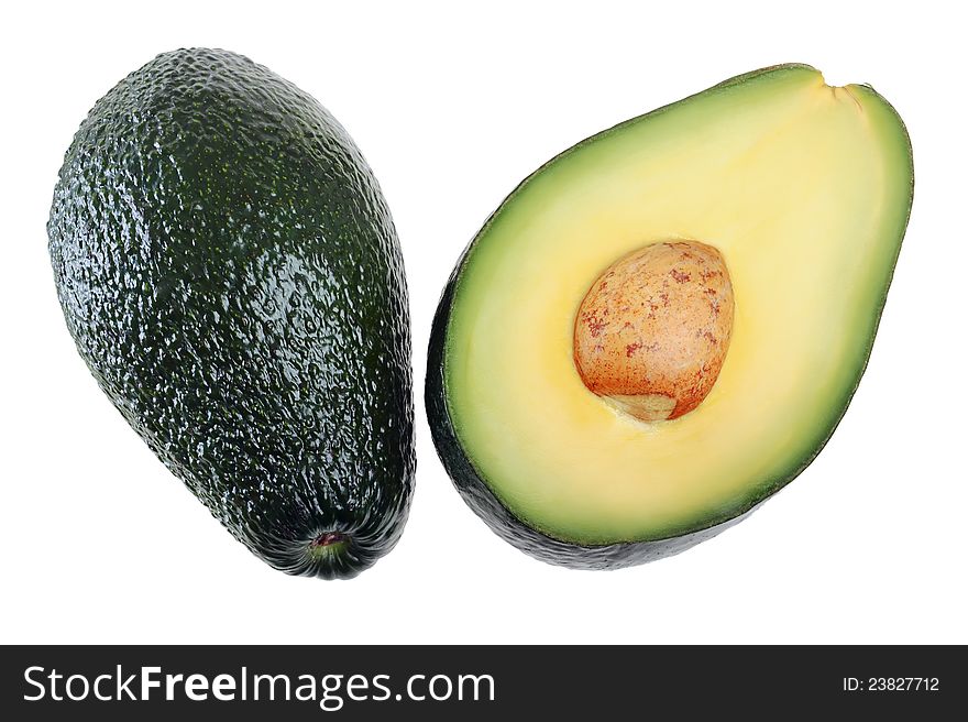 Whole and half avocados isolated on white background