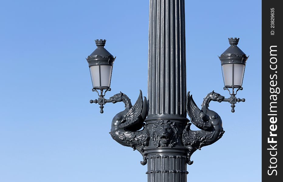 Double ornate street lamps.