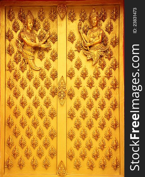 Buddhist decoration on a door in a temple. Buddhist decoration on a door in a temple