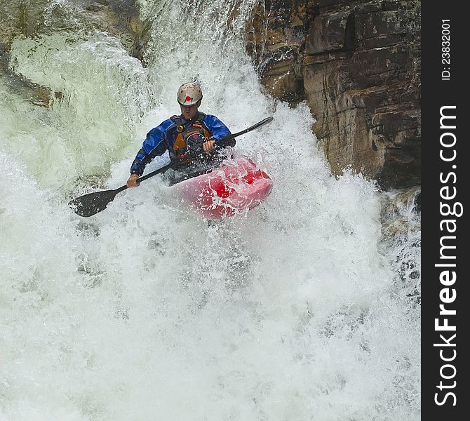 Kayaker In The Waterfall