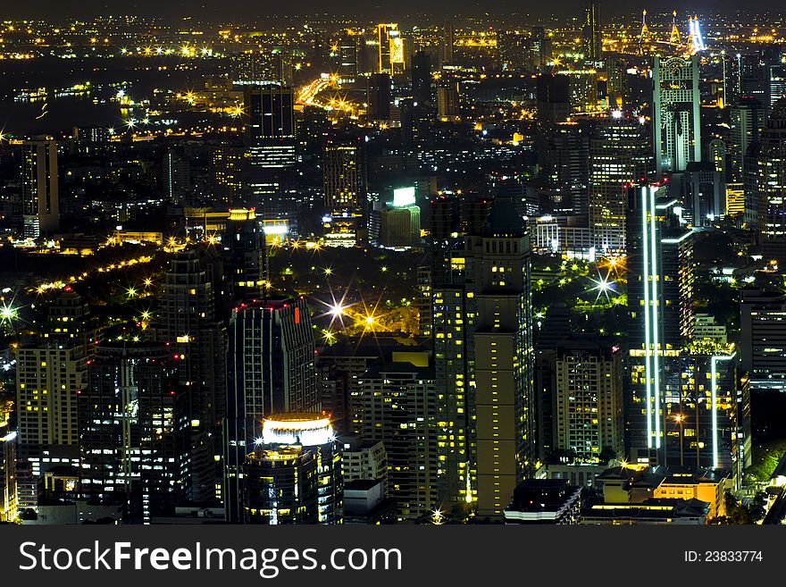 View over the city of bangkok at nighttime with skyscrapers