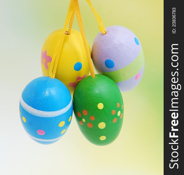 Easter eggs on blurred green  background