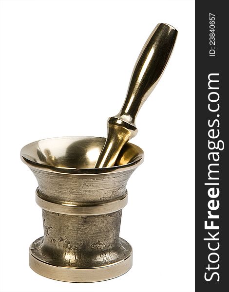 Brass mortar & pestle set isolated on white background, studio lights