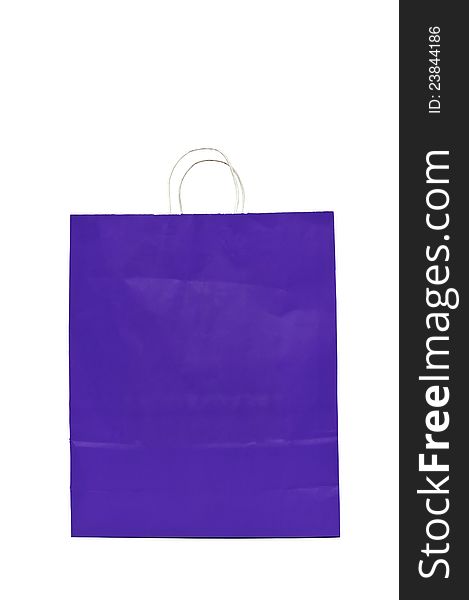 Straight on shot of a large purple paper gift bag with a cord handle. Isolated on white. Straight on shot of a large purple paper gift bag with a cord handle. Isolated on white.