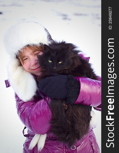 Kid Girl Holding Black Cat