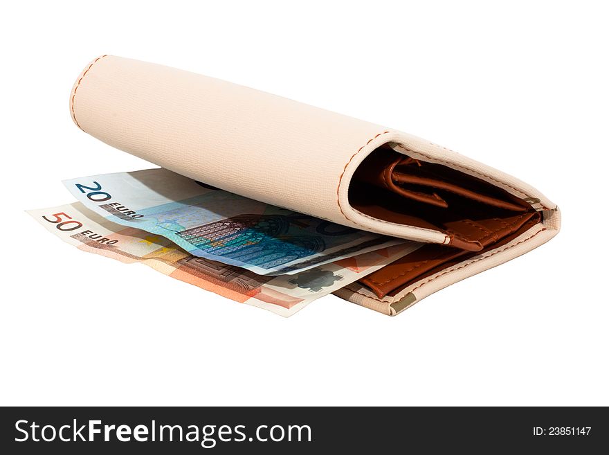 Monetary Denominations Lie In A Wallet On A White