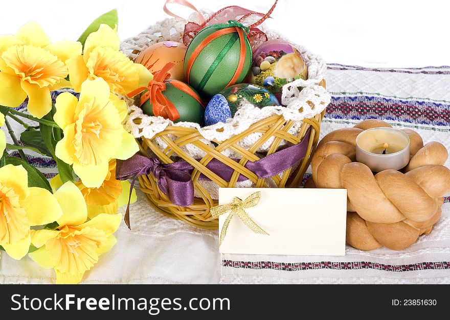 Festive table, Easter eggs, Easter cake, lit the candle and postcard. Festive table, Easter eggs, Easter cake, lit the candle and postcard