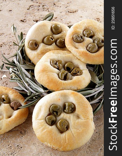 Group of focaccia pizza whit olives on the table