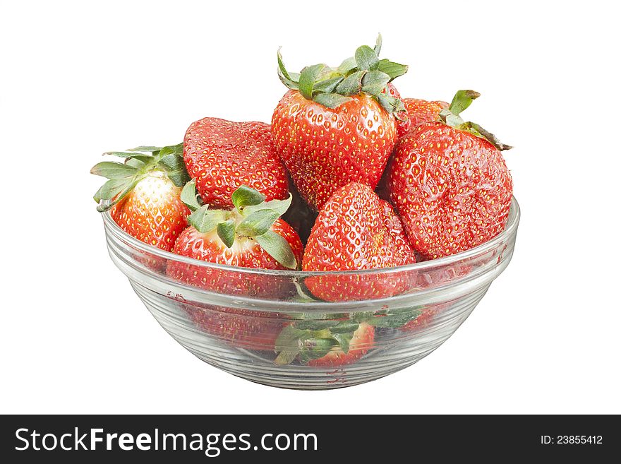 Ripe strawberry in glass bowl isolated over white background. Ripe strawberry in glass bowl isolated over white background
