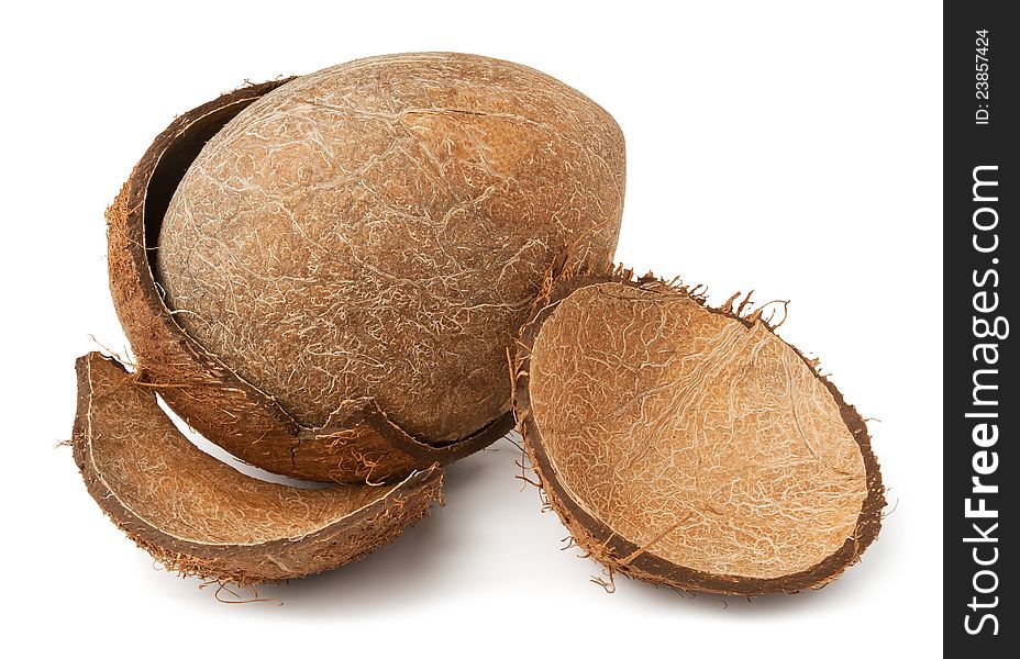 Cracked coconut against white background