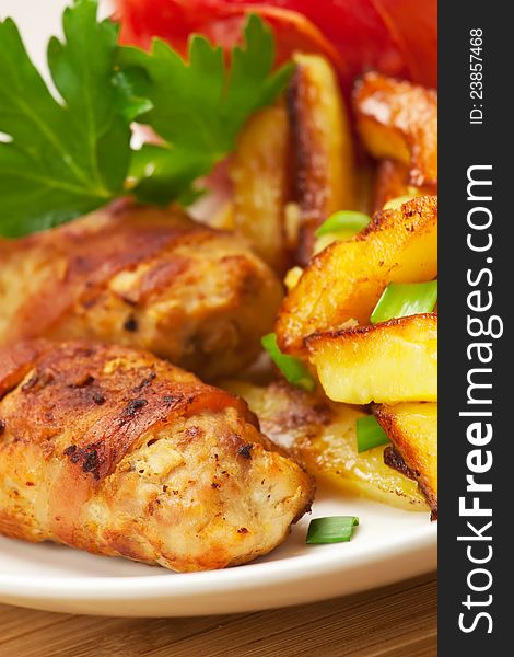 Fried cutlets and potato on a plate