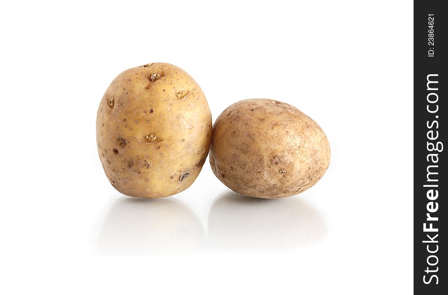Two raw potatoes on white background. Clipping path is included