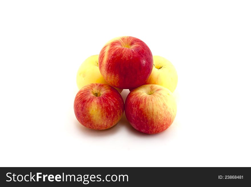 Five apples isolated on a white background.