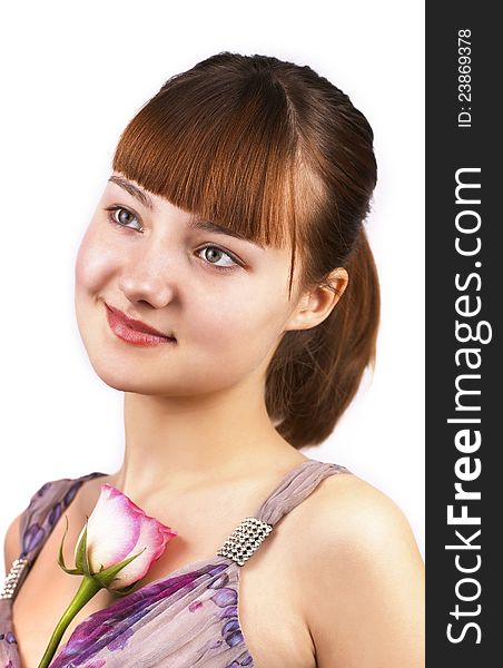 Portrait of beautiful woman with pink rose isolated on a white background