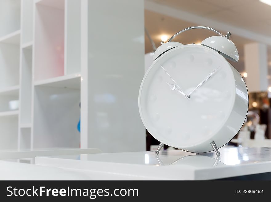 Photos of beautiful white classic alarm clock. Photos of beautiful white classic alarm clock