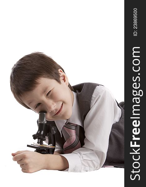 Portrait of a boy with a microscope