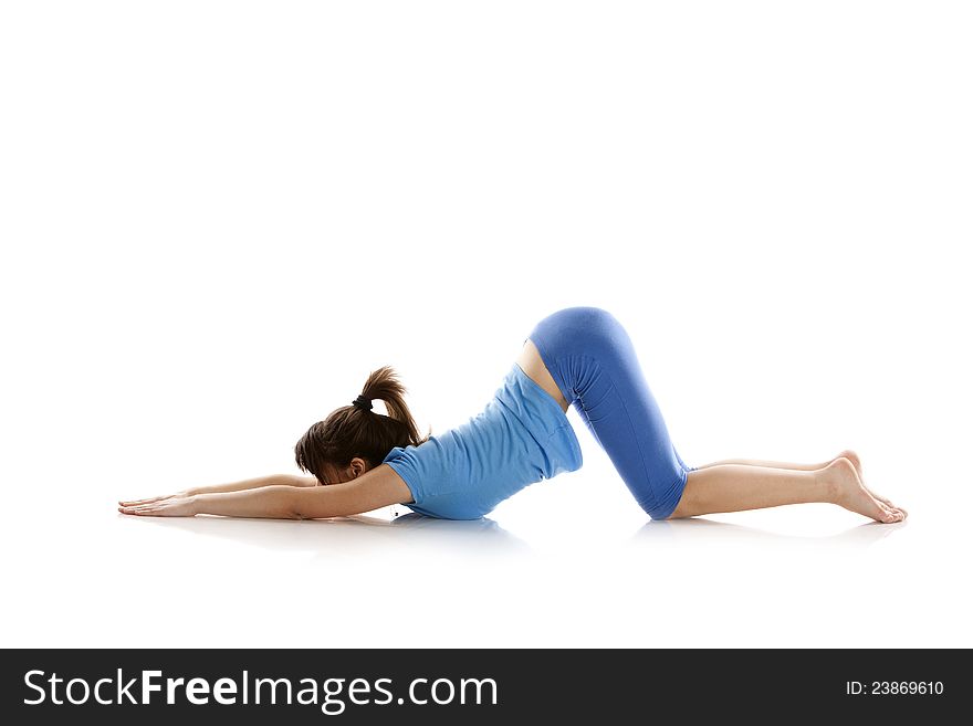 Image of a girl practicing yoga on white