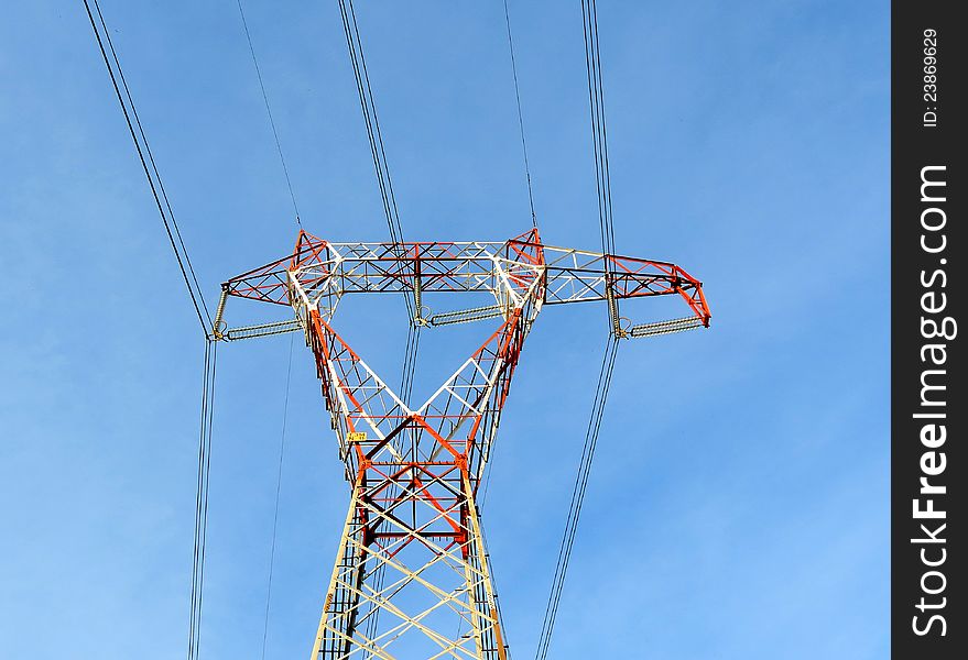 Power line pylon and blue sky