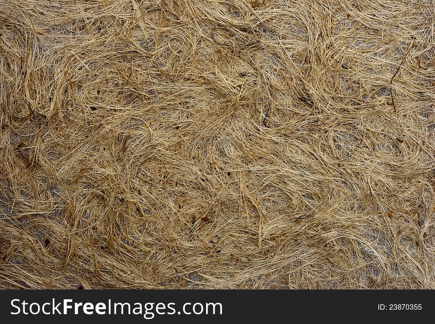 Closed up brown mulberry paper with wood pulp background.