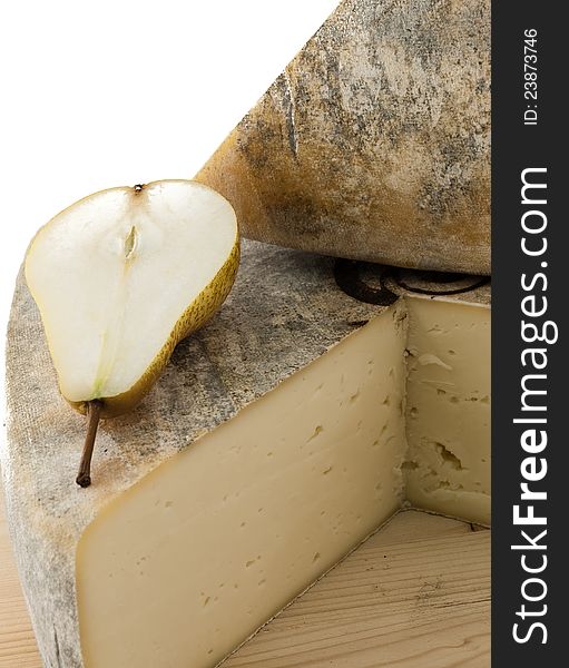 Pear and cheese composition isolated on a white background.