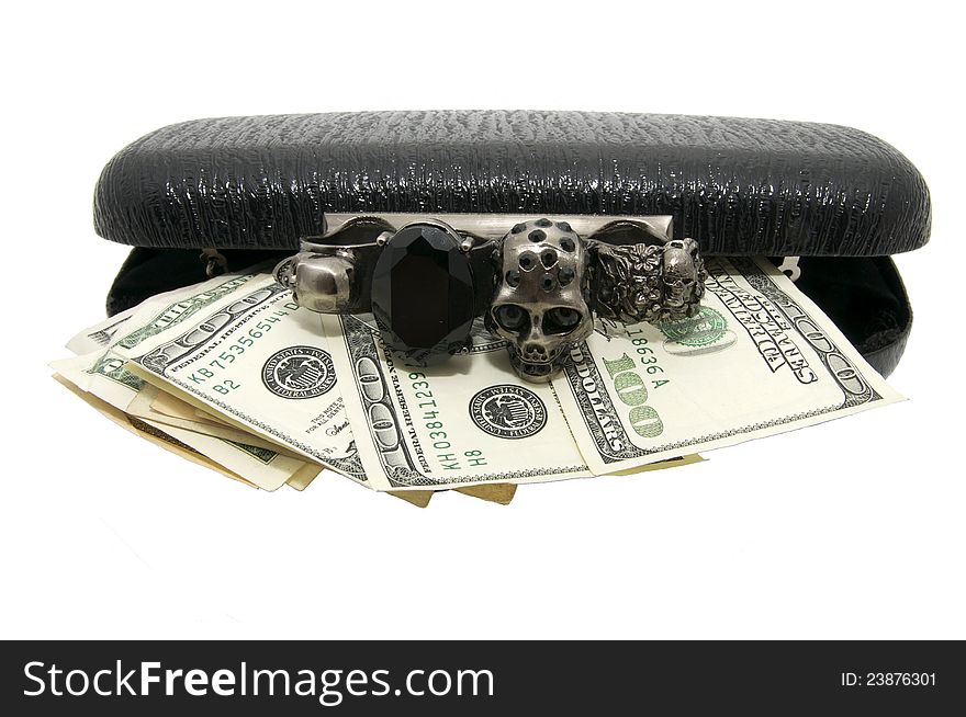 Female black clutch with the lock in the form of brass knuckles with dollars. Female black clutch with the lock in the form of brass knuckles with dollars