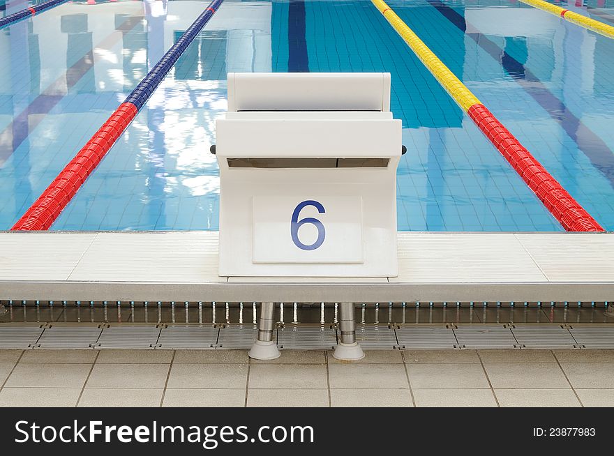 Swimming pool starting place with clearly marked lanes