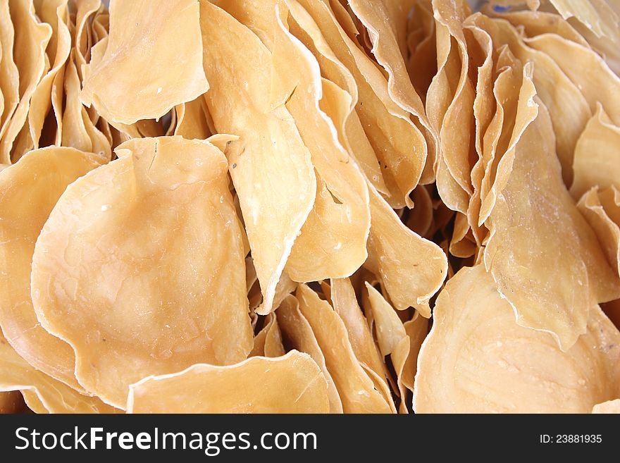 Indonesian raw crackers known as kerupuk made â€‹â€‹of flour and seasonings such as salt, pepper, and onion. Indonesian raw crackers known as kerupuk made â€‹â€‹of flour and seasonings such as salt, pepper, and onion.