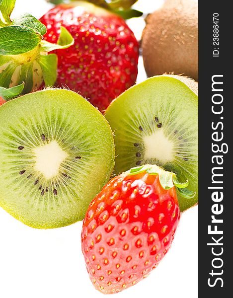 Fresh Kiwi and strawberry isolated over white background