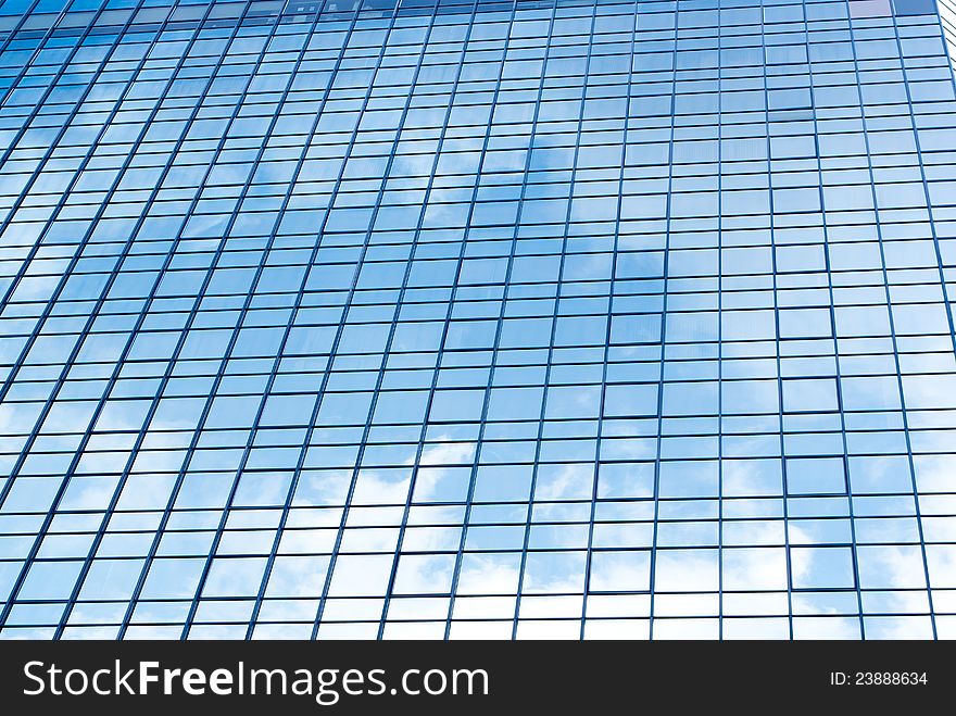 Blue sky reflection on modern building