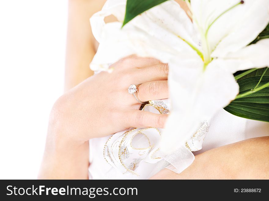 Wedding ring on a woman's finger, isolated on white. Wedding ring on a woman's finger, isolated on white