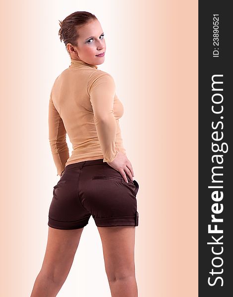 Beautiful and elegant middle-age woman, view from back, studio shot. Beautiful and elegant middle-age woman, view from back, studio shot