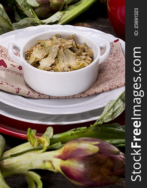 The first dish of rice with artichokes. The first dish of rice with artichokes