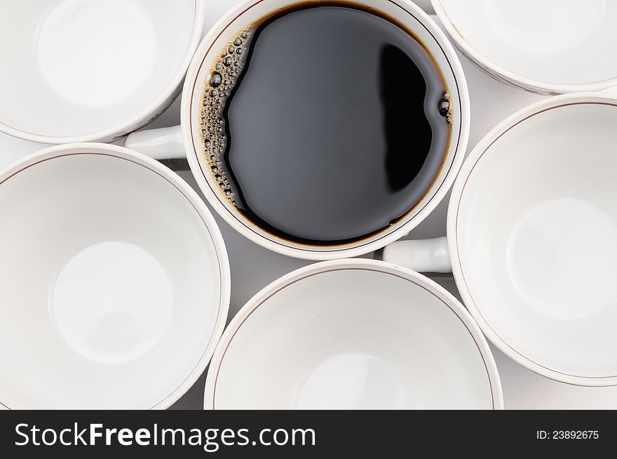 Group of coffee mug full and empty over white background. Group of coffee mug full and empty over white background