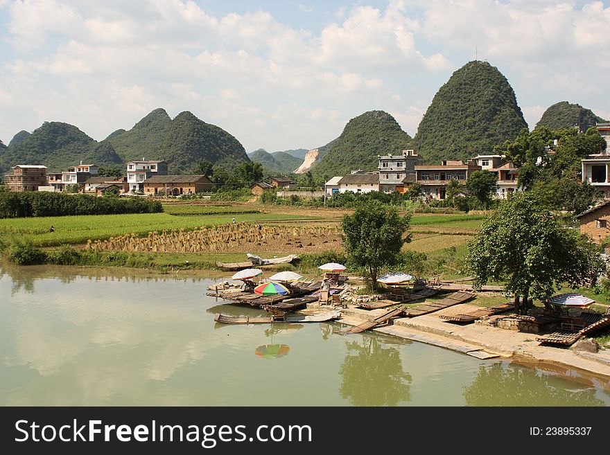 Beautiful Chinese landscape of Yangshuo with river and water meadows. Beautiful Chinese landscape of Yangshuo with river and water meadows