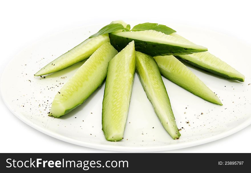 Sliced cucumber mint decorated with a white background