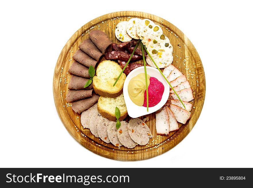 Wooden plate with sausage on a white background