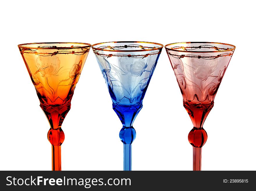 Graceful color glasses for wine on a white background