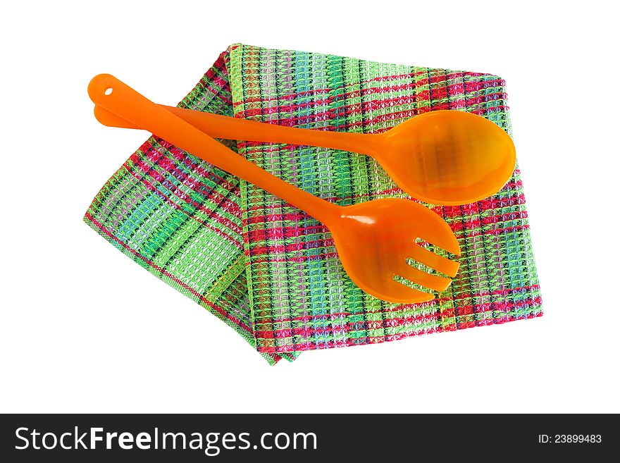 Spoons  for salad and kitchen towel isolated on white. Spoons  for salad and kitchen towel isolated on white