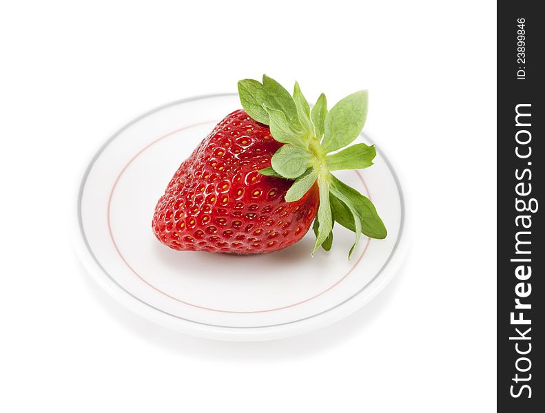 Strawberries on a plate on white  background