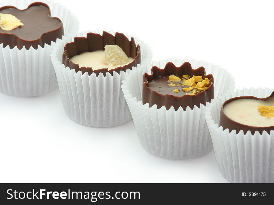 Chocolate candies isolated on white background.